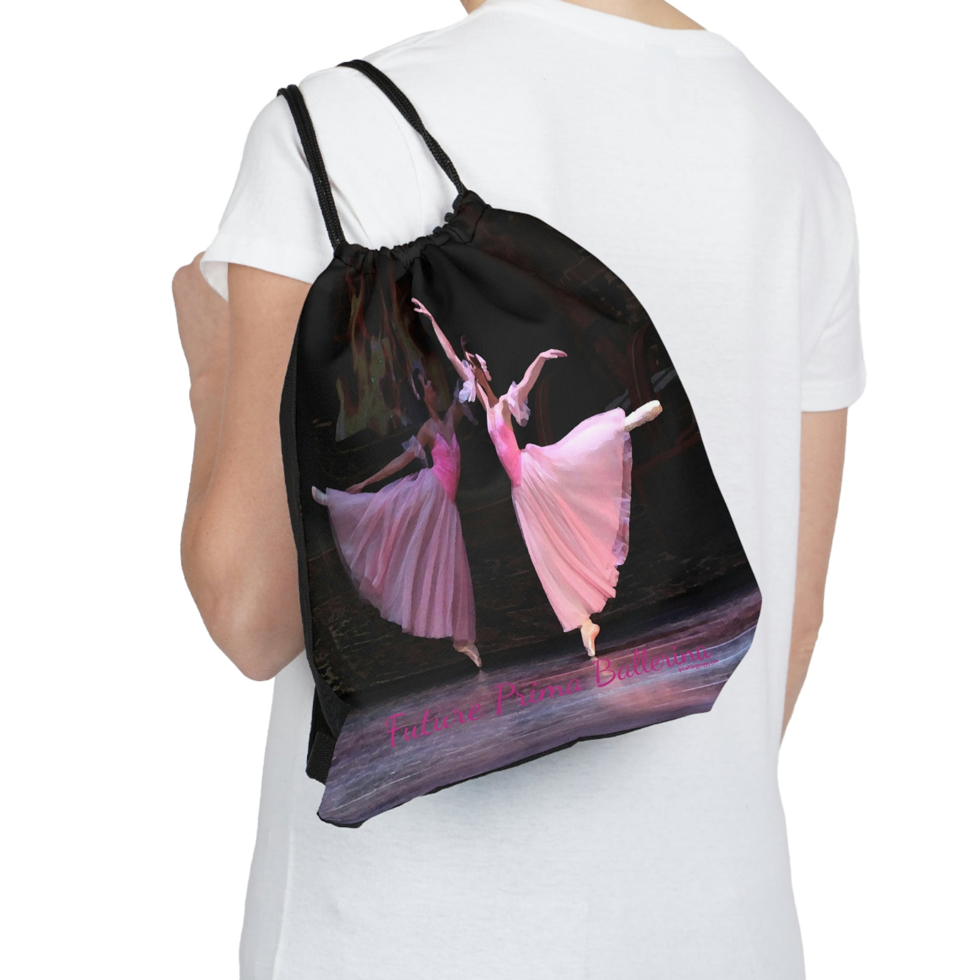 black drawstring bag with two ballet dancers in arabesque dressed in pink