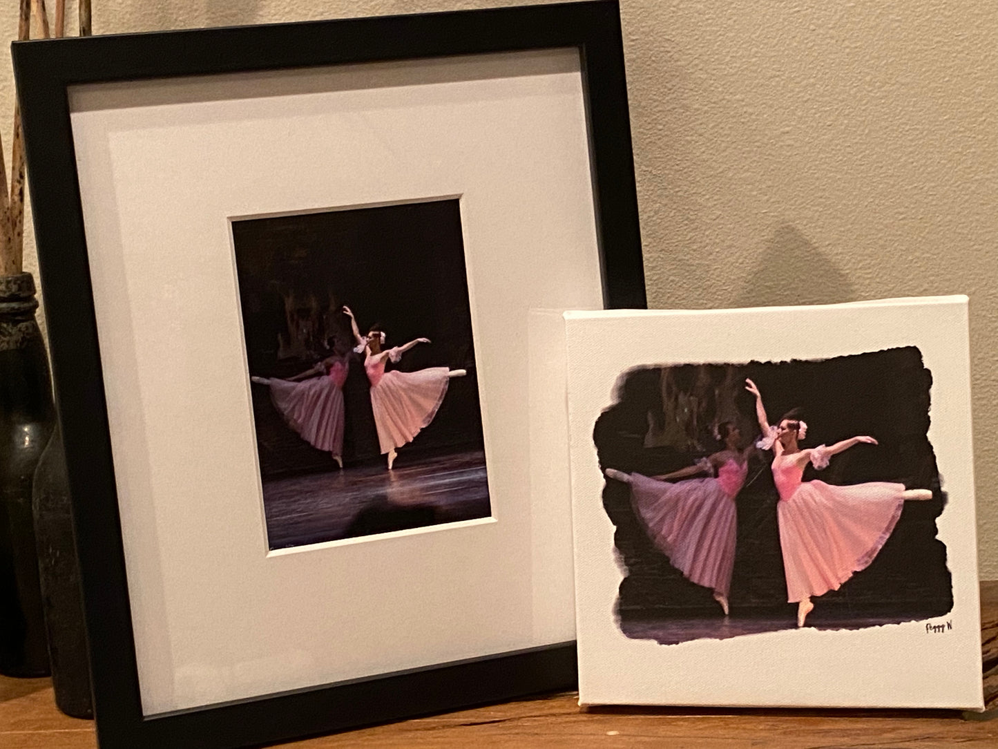 photo showing two ways to print the painting one as an oil on canvas and the other a framed photo print in a black framed