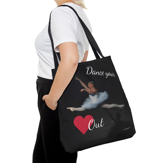 Black, white, and red, dance tote bag with ballerina jumping in mid air that says Dance your heart out with a red heart instead of the word.