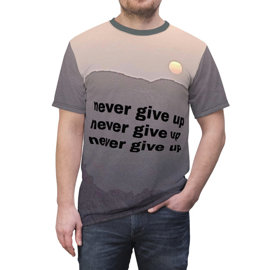 model wearing a tee shirt of a mountain scene and sunset that says never give up three times in a row