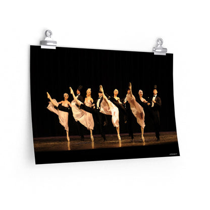 3 female dancers and 3 male dancers in a black and white theme kick line.