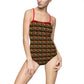 one piece swimsuit with AOP of modern dancers in primary colors with red straps.