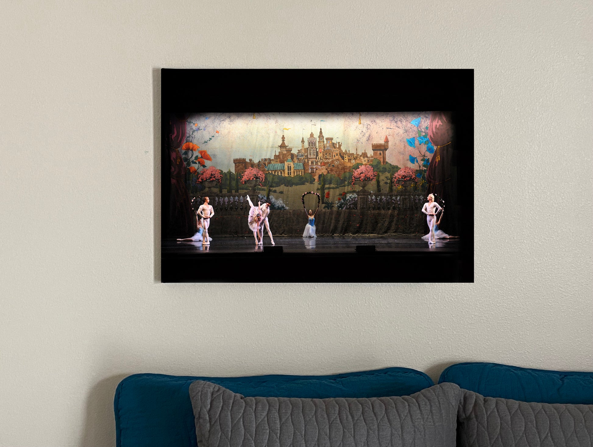 ballet performers on stage with a fairytale castle background performing the Nutcracker 3 male dancers and 4 female