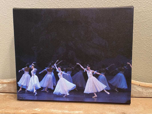 a photo of Artwork of Graceful ballet dancers in white dresses wearing tiaras performing on stage on a dark winter scene backdrop