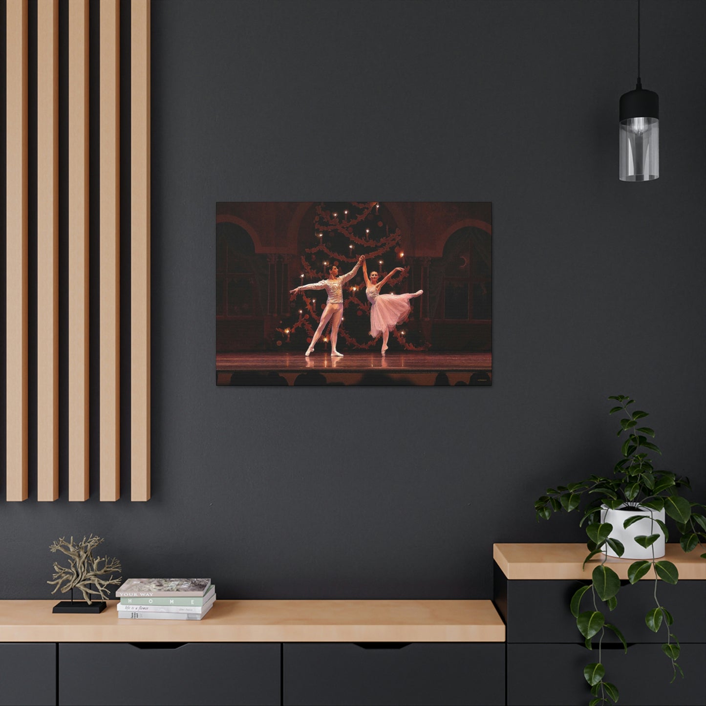 A livingroom setting displaying a painting of a Ballet couple dancing in a Nutcracker performance on stage