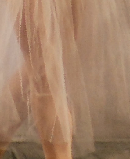 detail section of the white skirt
