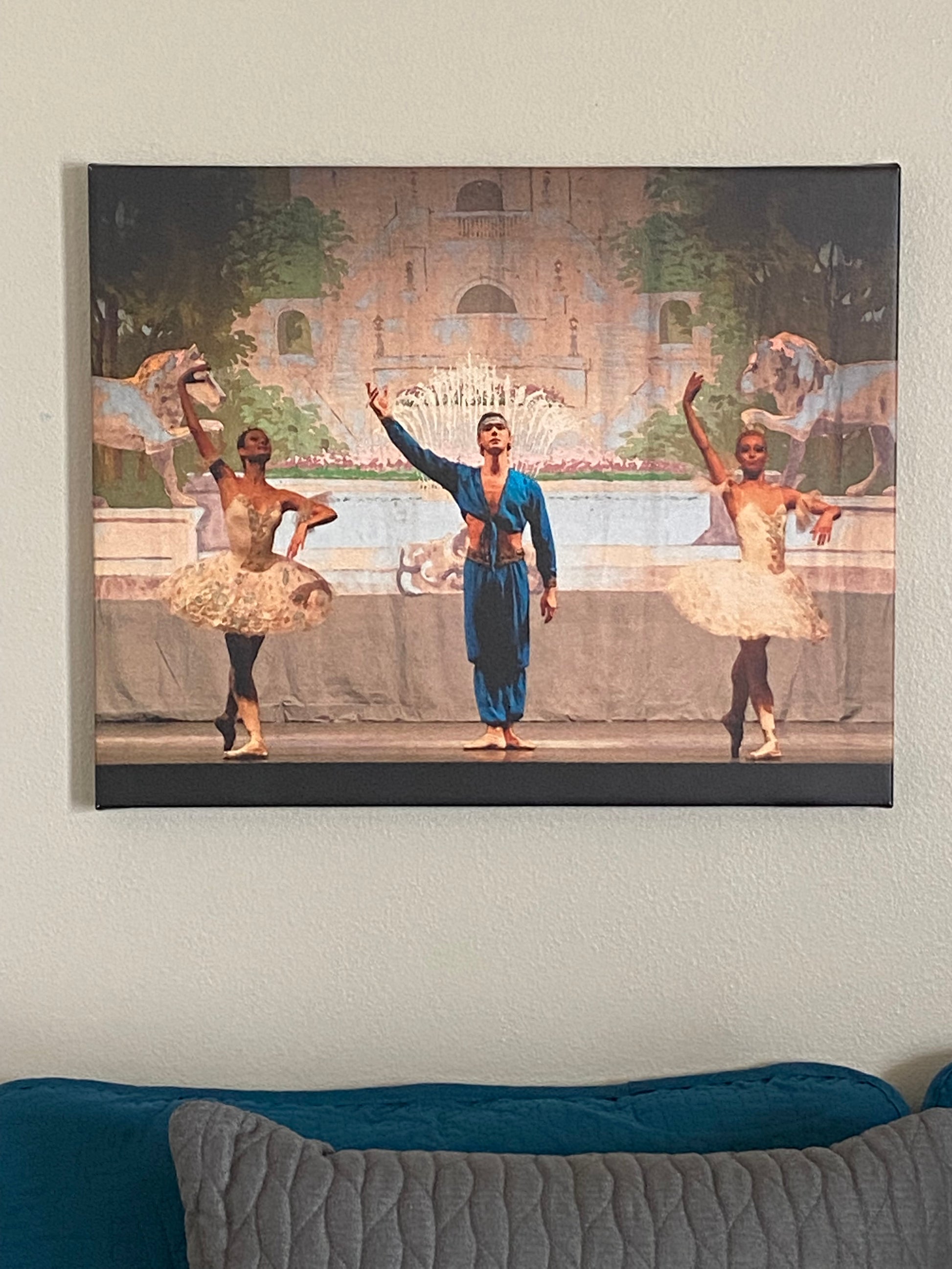 3 dancers from a Nutcracker performance. Two female dancers with a male dancer in the center. Arabian scene.