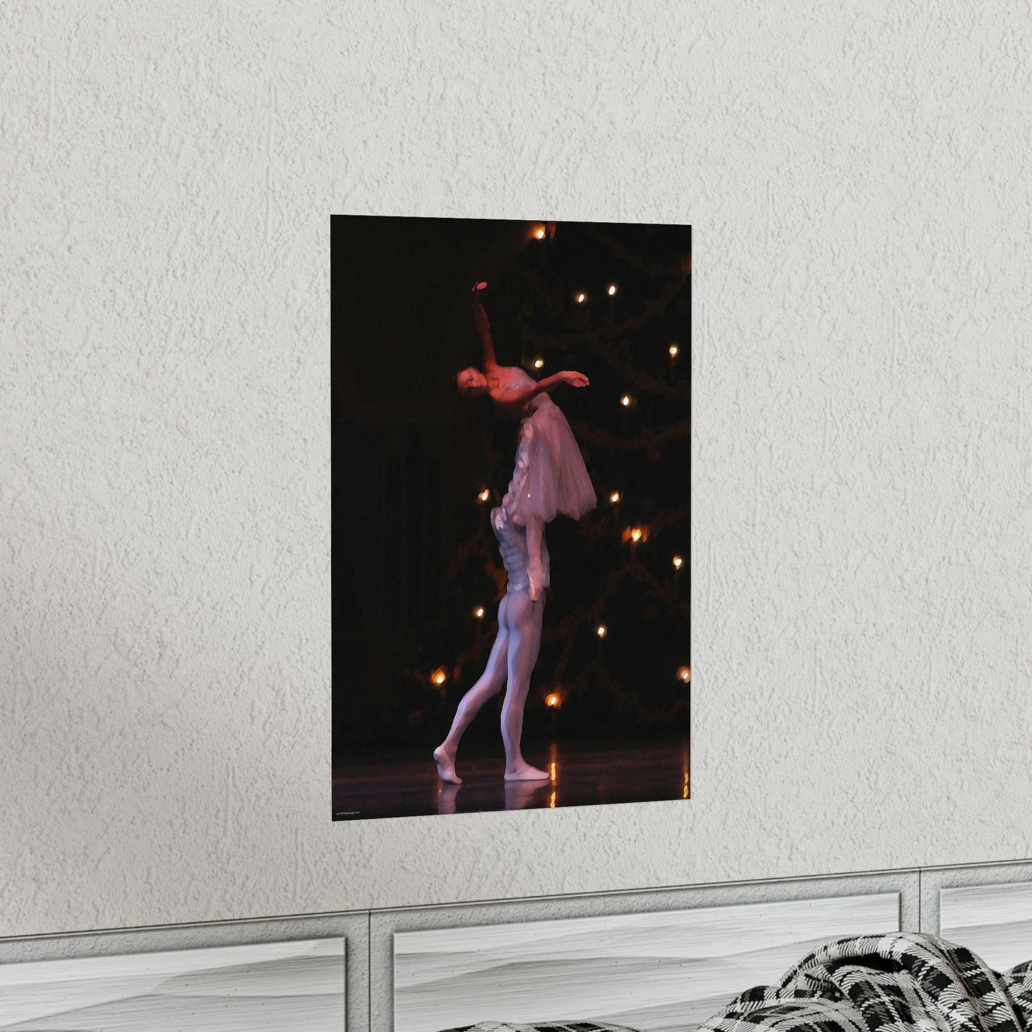 male dancer holding a female dancer in the air on a black background on a premium matte poster.