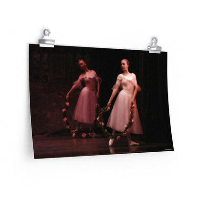 two female dancers in pink holding floral wreaths on a premium matte poster.