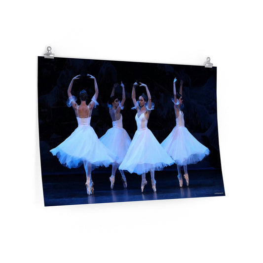 four dancers en pointe with white flowing costumes on a premium matte poster.