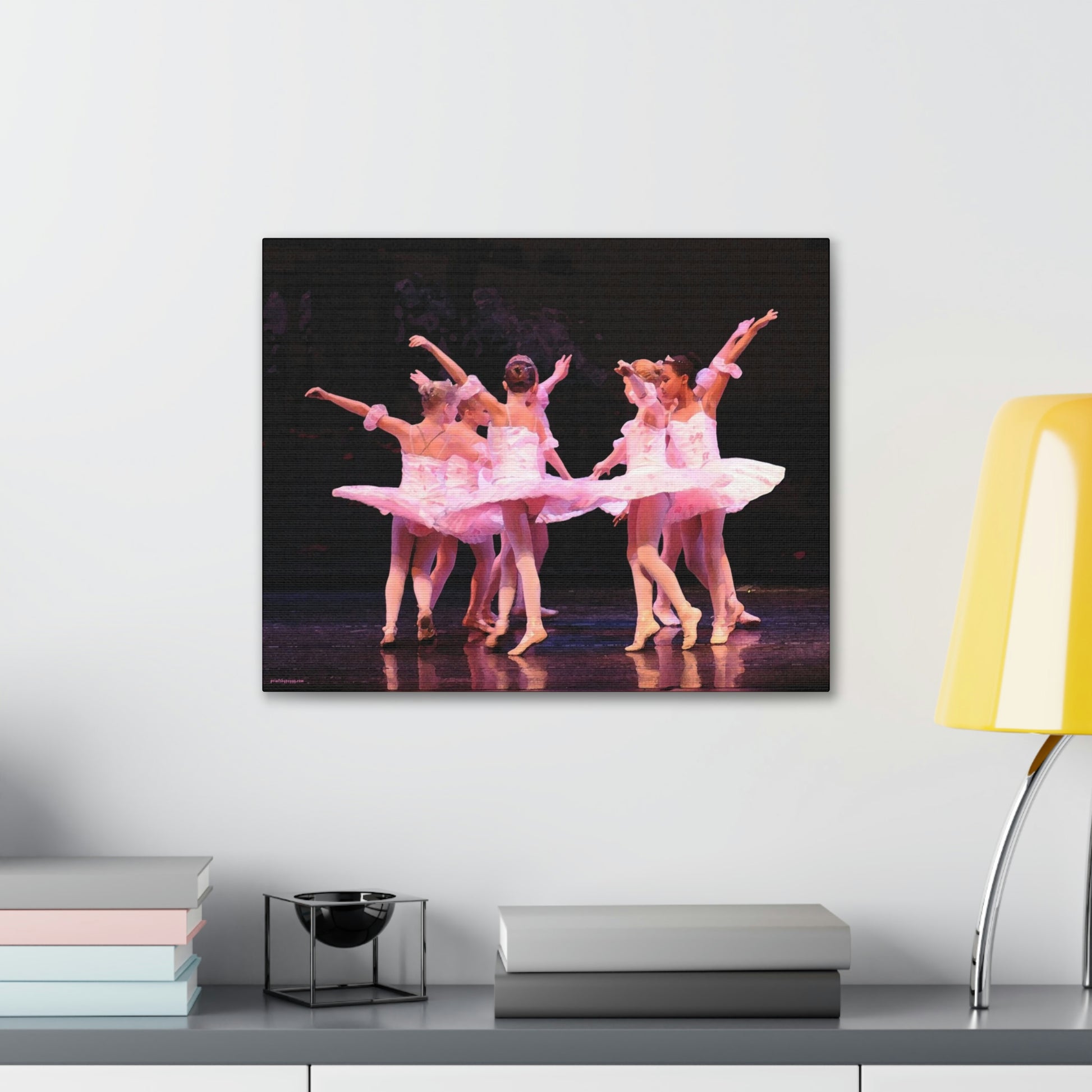 Group of child ballerinas dressed in pink tutus.  