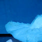 close detail of ballerina painting in white costume