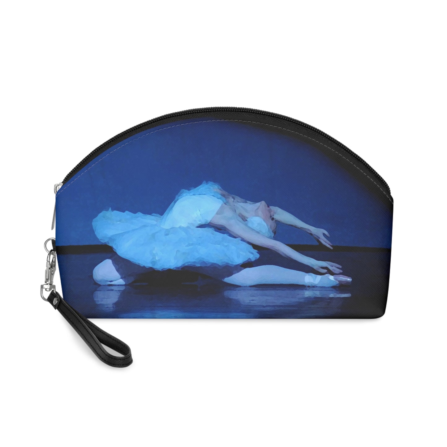 Prima ballerina performing the dying swan dressed in a white tutu bathed in blue light on a black background on a makeup bag.