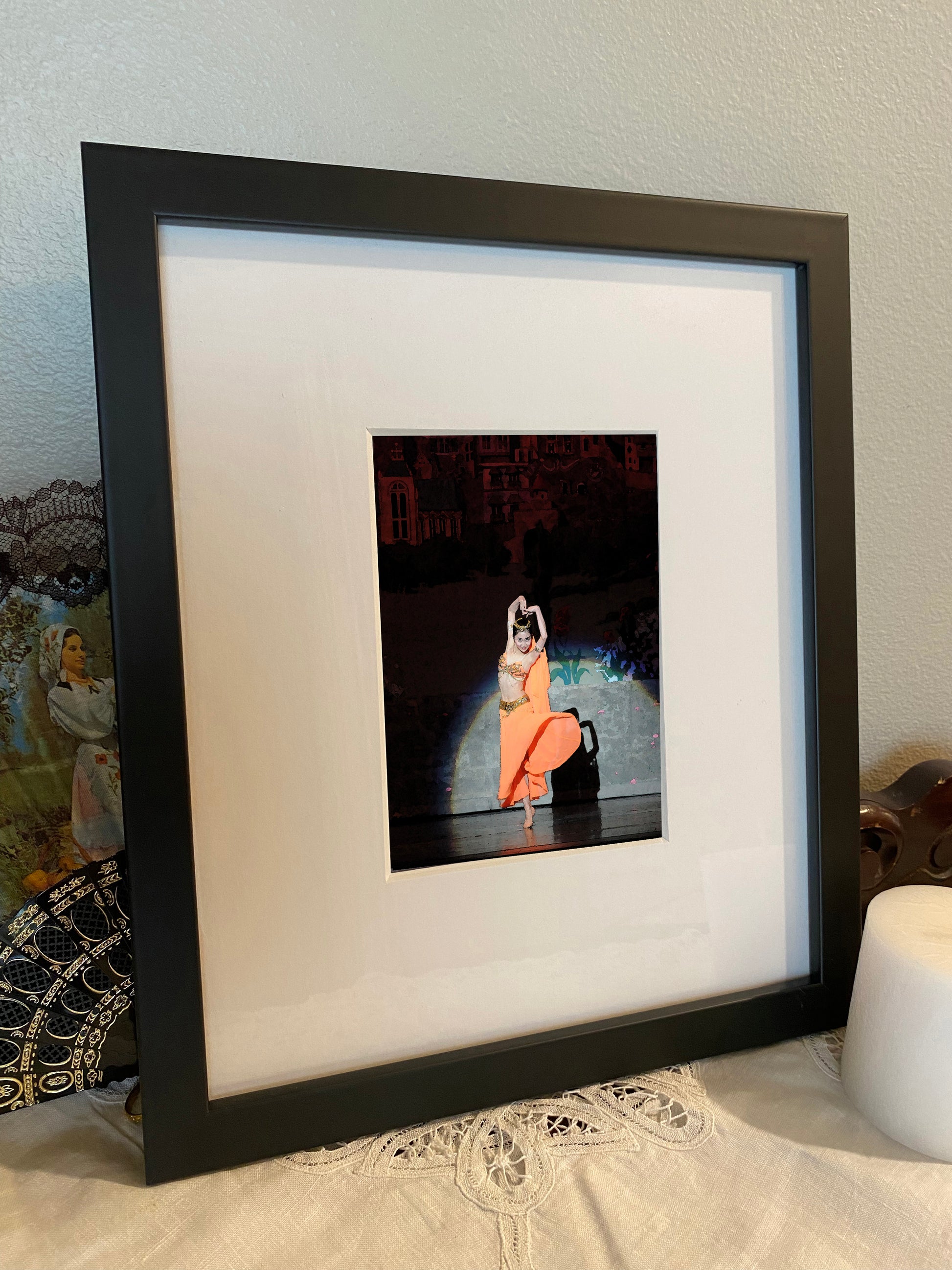 painting of girl dancing dressed in an orange belly dancer costume