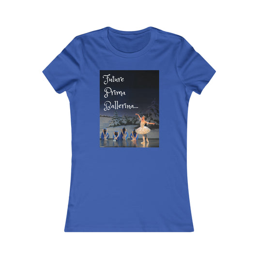 Front side of Bright blue tee shirt with a picture of a prima ballerina dressed in white on stage with a winter scene backdrop and ballerinas dressed in blue bowing that says Future Prima Ballerina