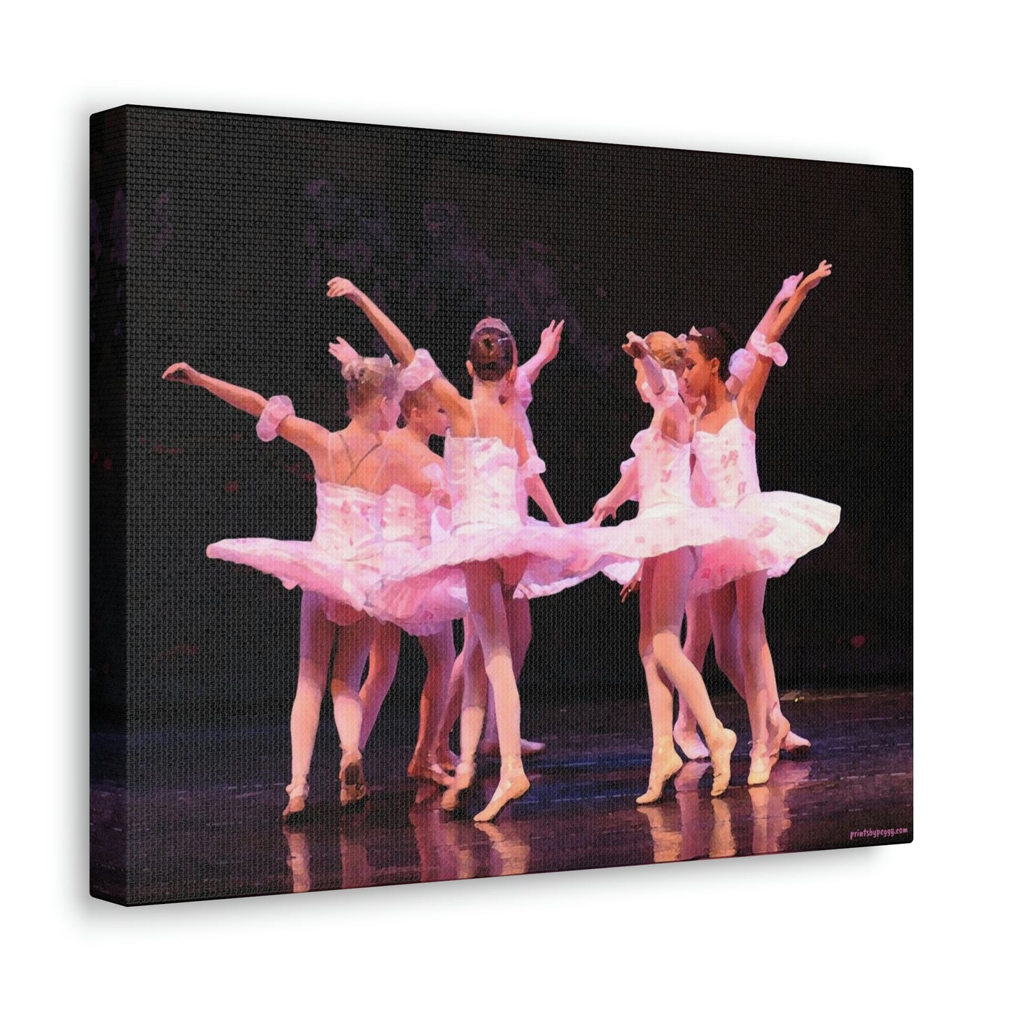 Group of child ballerinas dressed in pink tutus.  