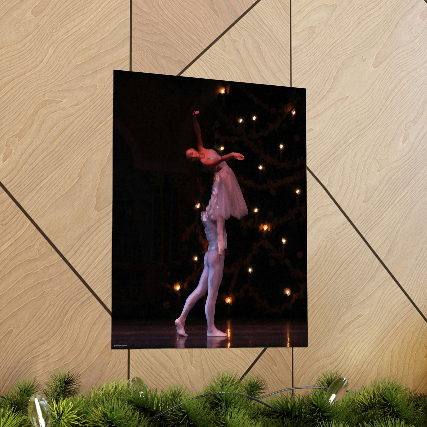 male dancer holding a female dancer in the air on a black background on a premium matte poster.