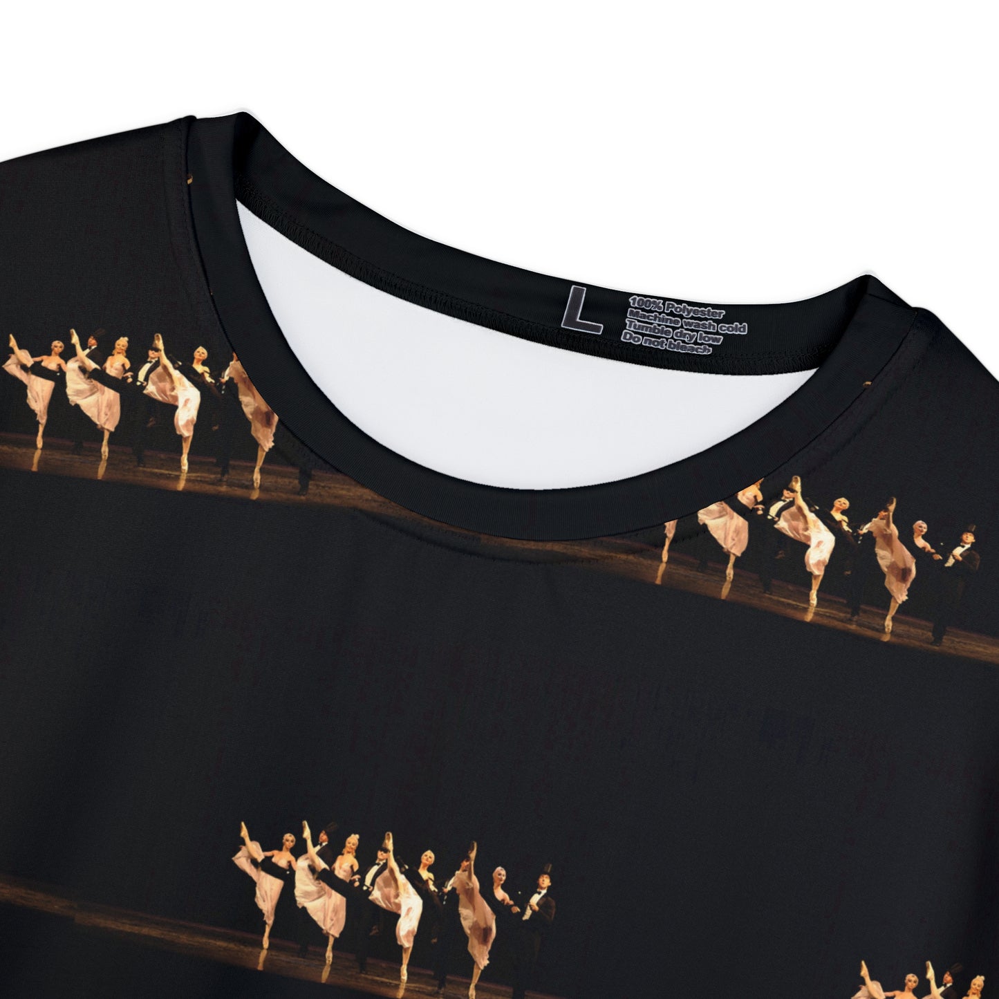 close up view of the neckline of the black shirt with ballet dancers in black and white costumes on a black background