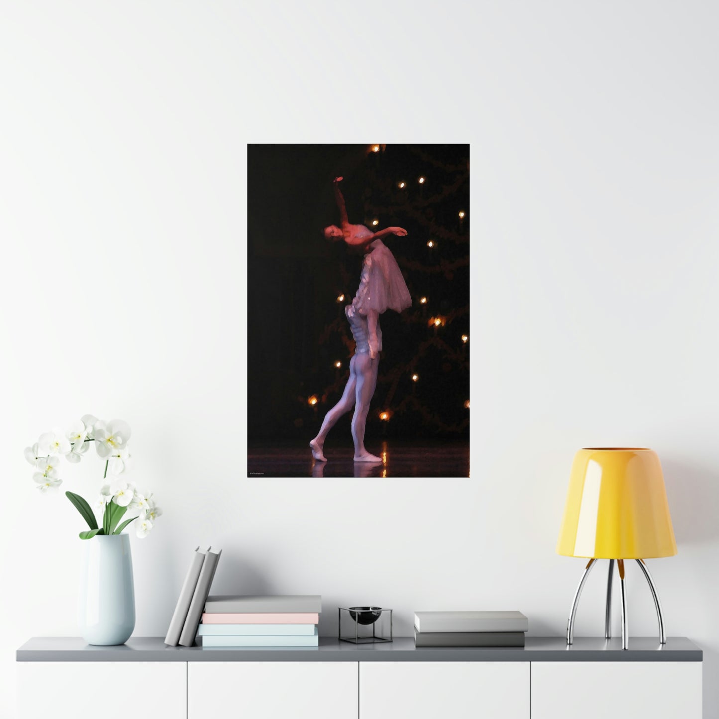 male dancer holding a female dancer in the air on a black background on a premium matte poster.