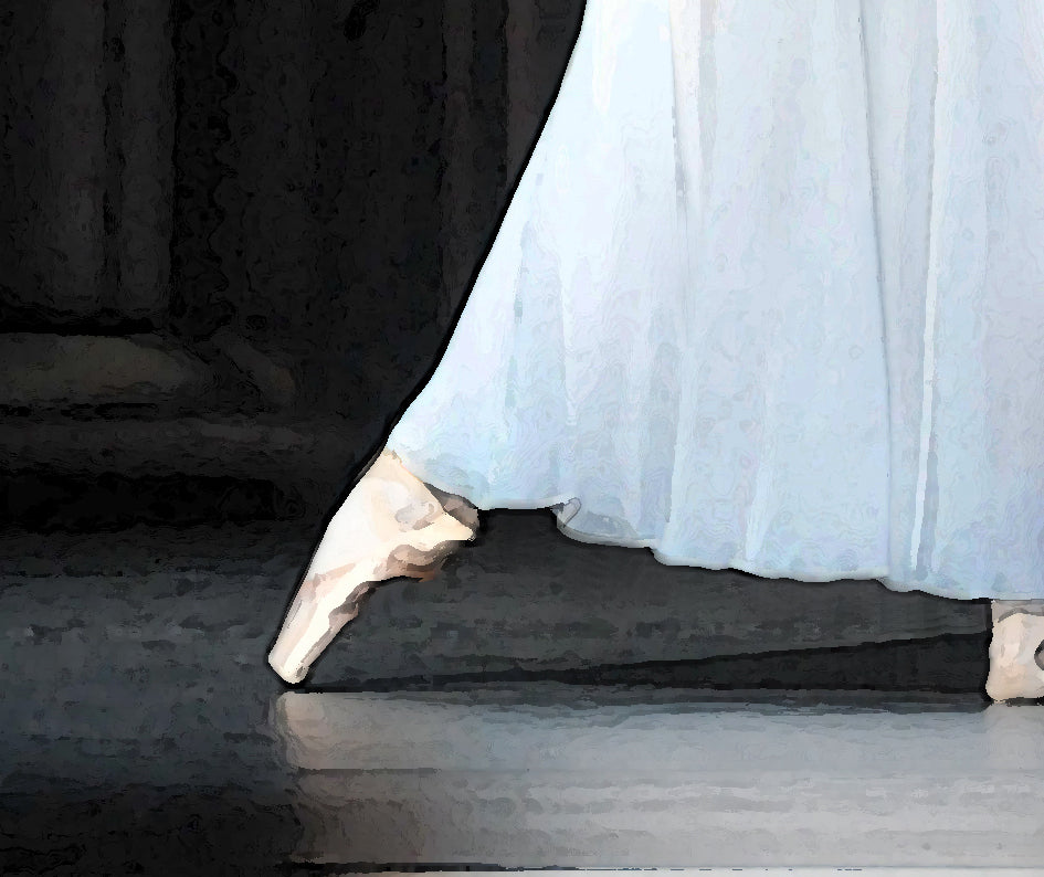 detail section of the ballerina's shoe and white dress