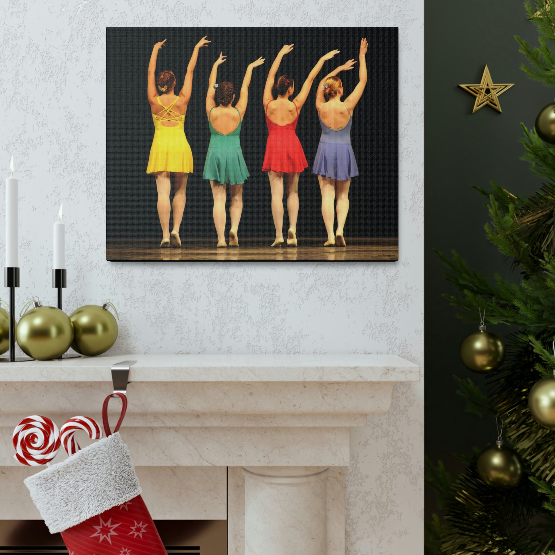 Art image hanging on the wall in a home setting decorated for the holidays of a painting of four modern dancers from the rear on stage in bright costumes