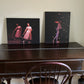 two oil paintings displayed in a home setting of Nutcracker ballet performances