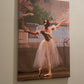 A photo of an oil painting hanging on a wall of a graceful ballerina performing on stage in a white dress with a colorful background