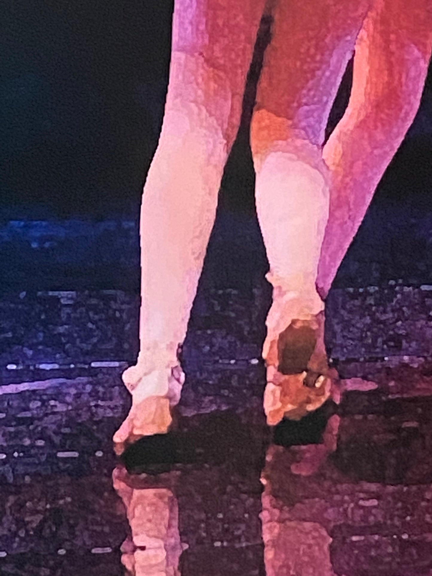 detail section showing dancer's feet and legs