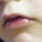 detail of artwork showing a child's lips