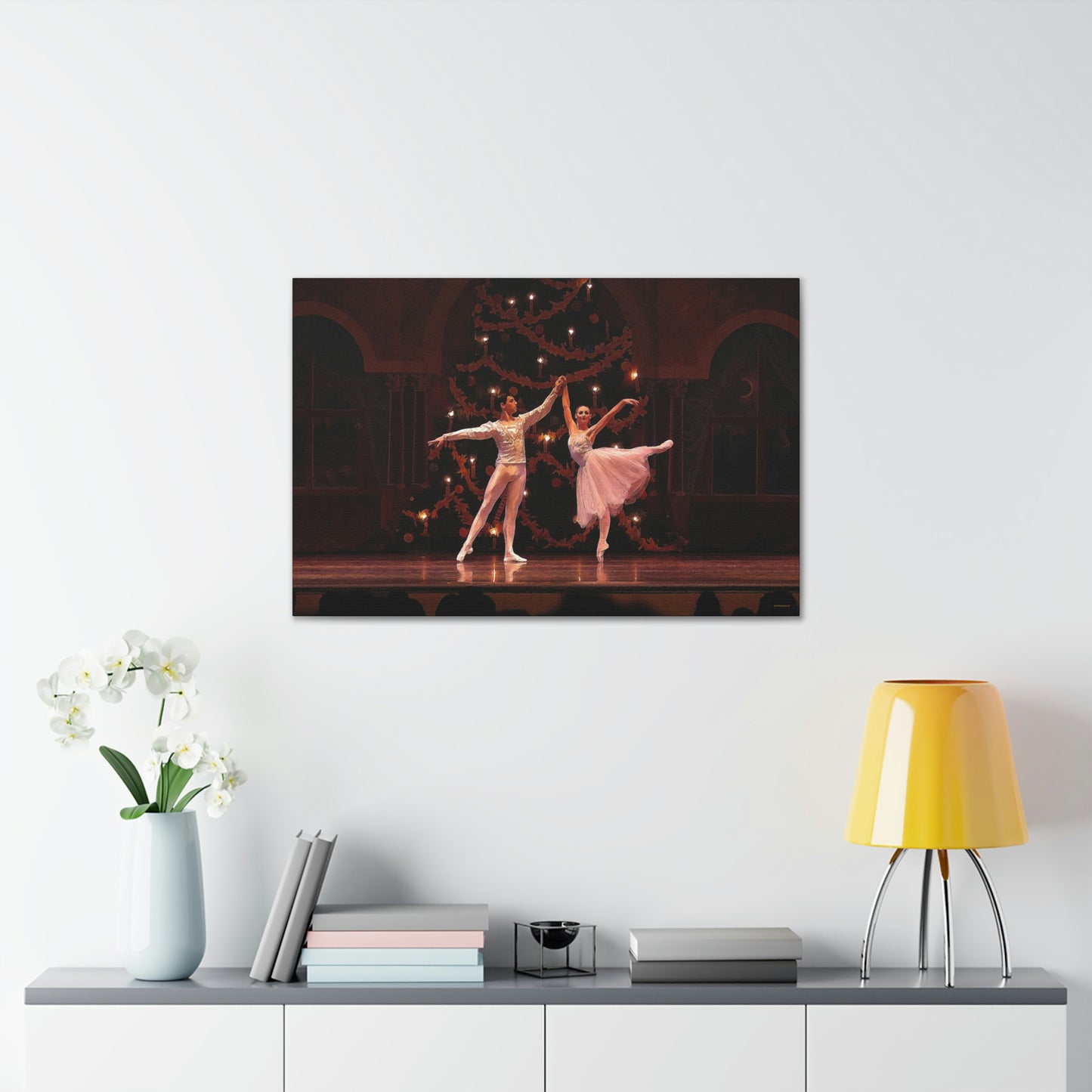 A Canvas Painting hanging over a desk of a Ballet couple dancing in a Nutcracker performance on stage