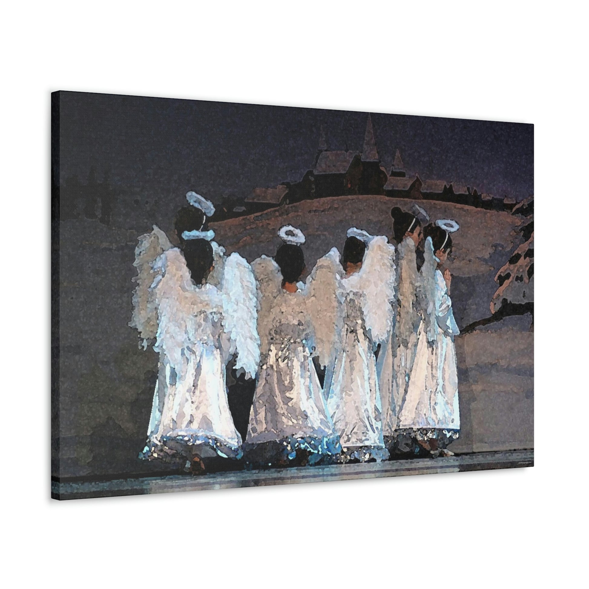 Canvas print painting hanging on a wall of children in angel costumes with a winter scene backdrop  