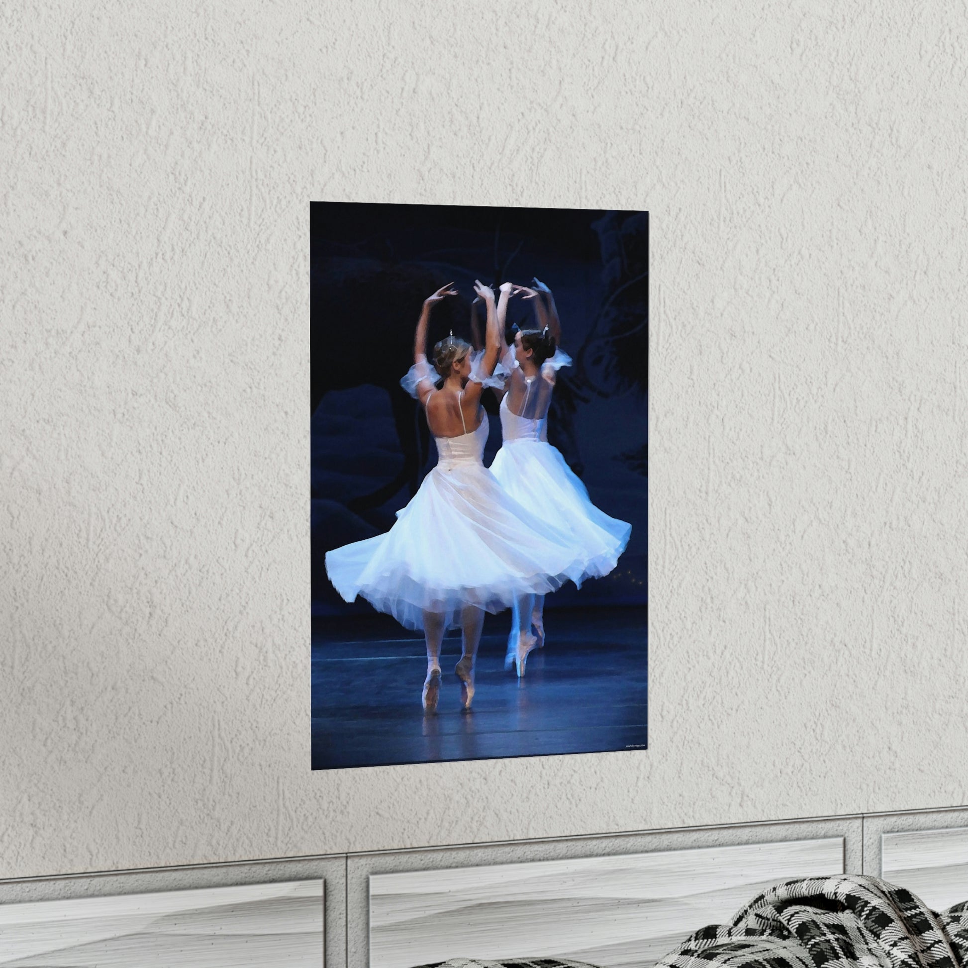 two ballerinas in white flowing costumes with a dark background premium matte poster.