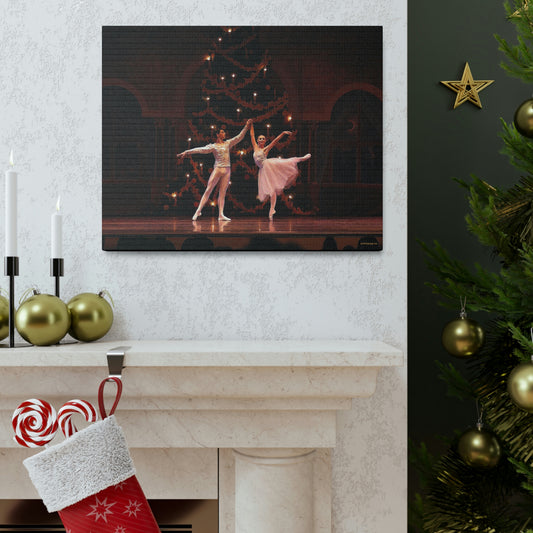 A holiday setting displaying a painting of a Ballet couple dancing in a Nutcracker performance on stage