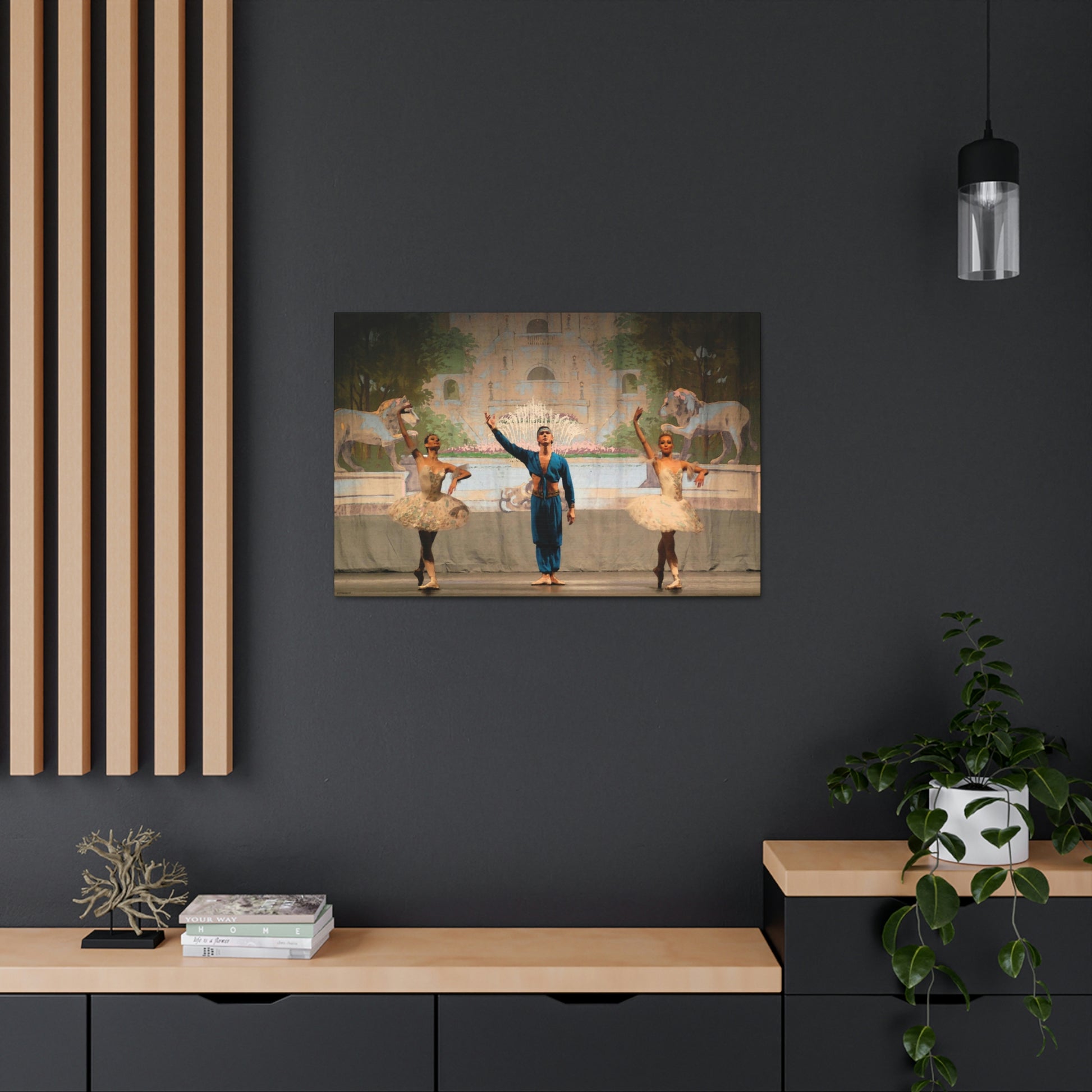 painting of 3 dancers from a Nutcracker performance. Two female dancers wearing white with a male dancer wearing bright blue in the center. Arabian scene.