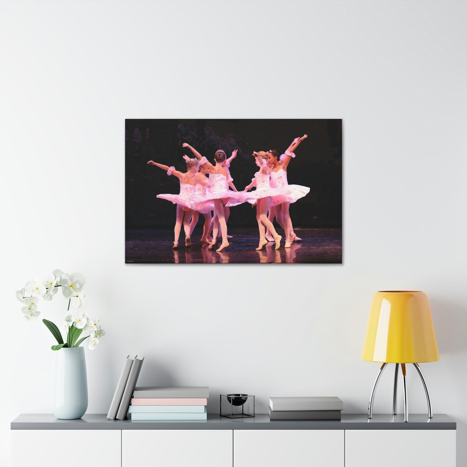 Group of child ballerinas dressed in pink tutus.  