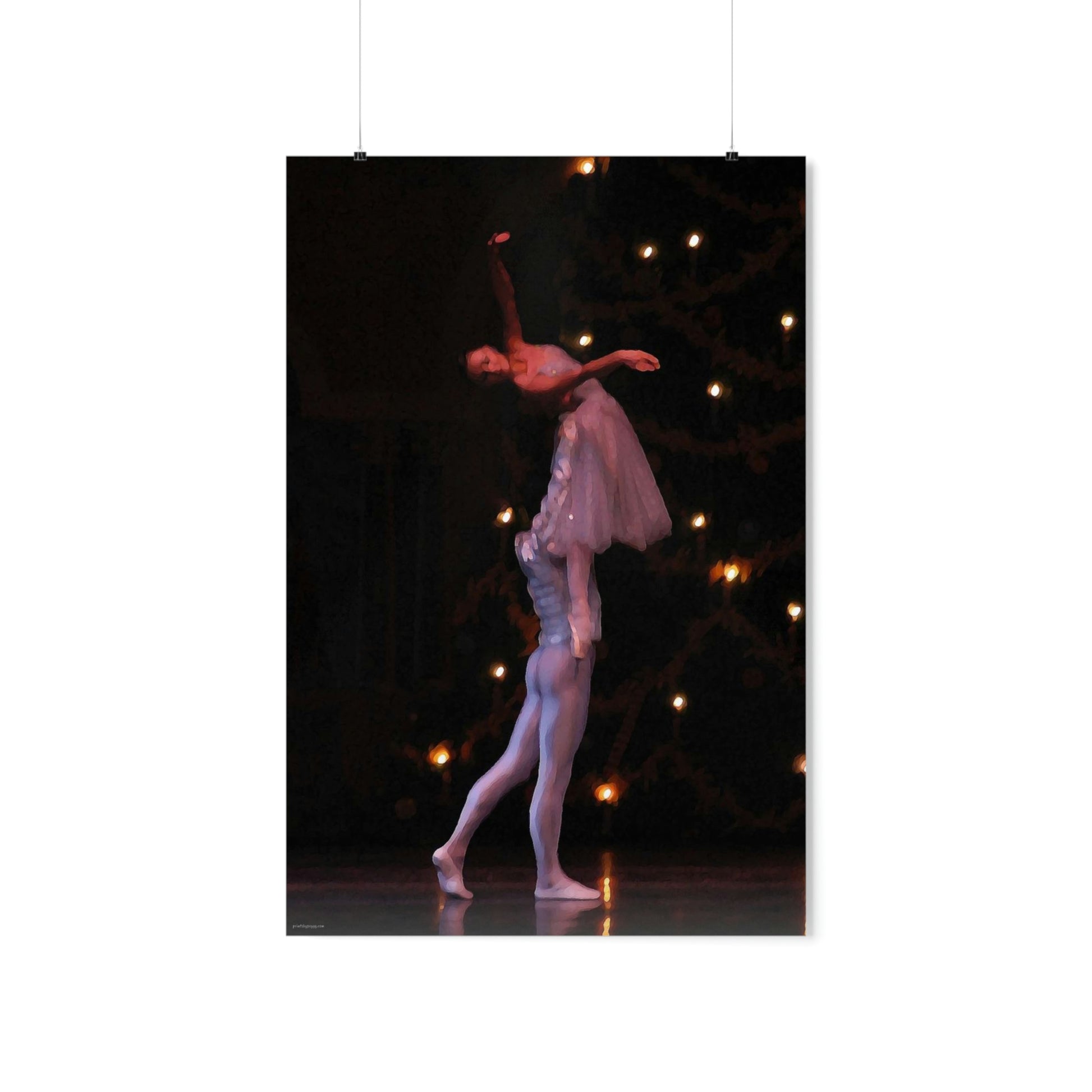 male dancer holding a female dancer in the air on a black background on a premium matte poster.