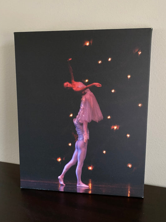 Artwork of Ballet couple performing on stage in a dramatic lift position